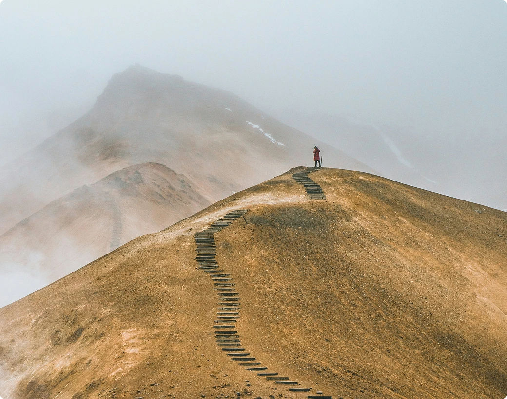 Person on top of mountain
